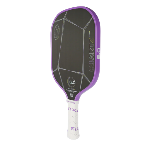 Pickleball paddle with 'Quartz' and 'Six' branding on a white background