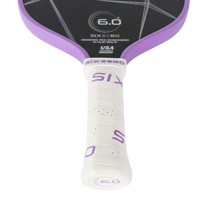 Close-up of a Sixzero paddle with purple and white design on a white background