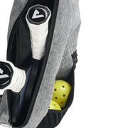 Gray golf bag with golf clubs and balls on a white background