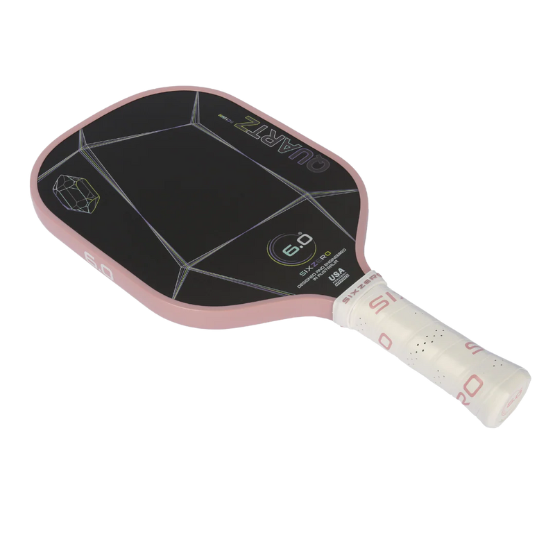 Pink and black pickleball paddle on a white background