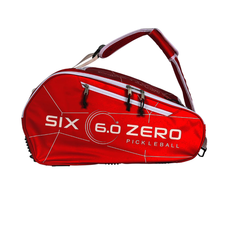 Red pickleball bag with 'SIX 6.0 ZERO' branding on a white background
