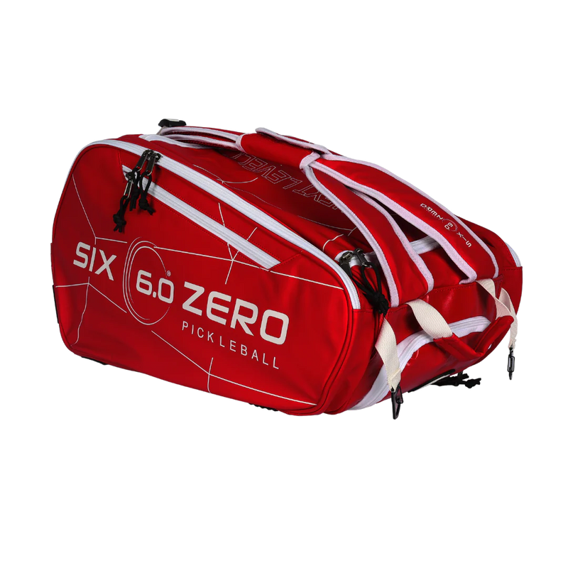 Red pickleball bag with 'Six 6.0 Zero' branding on a white background