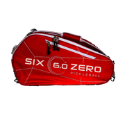 Red pickleball bag with 'Six 6.0 Zero' branding on a white background