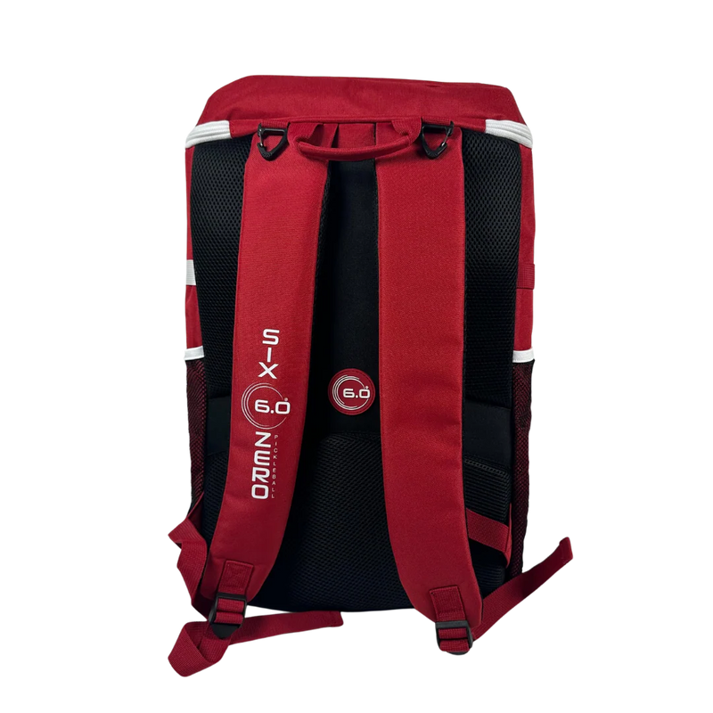 Red and black backpack with visible branding on a white background