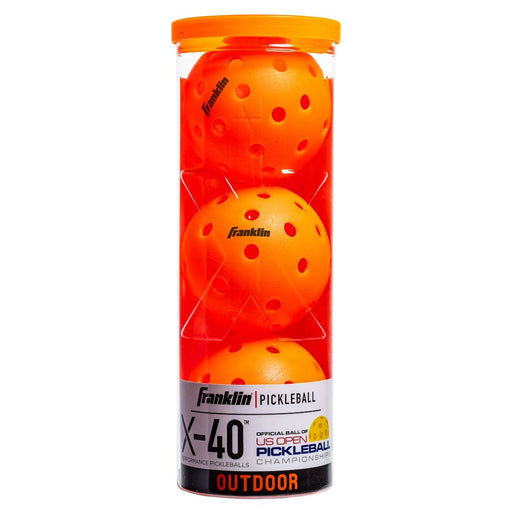 Tube of Franklin pickleballs with orange balls on a white background