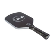 Black pickleball paddle with '6.0' branding on a white background