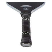 Close-up of a Sixzero pickleball paddle with branding on a white background