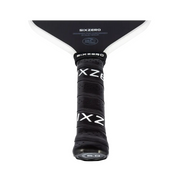 Close-up of a Sixzero pickleball paddle with black and white design on a white background