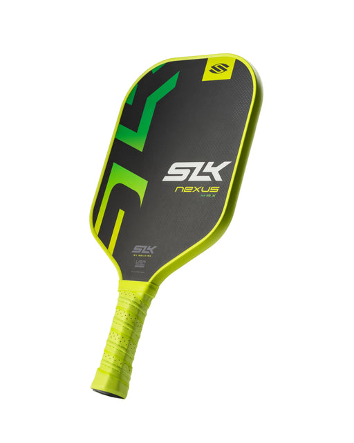 Pickleball paddle with green and black design on a white background