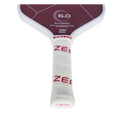 Pickleball paddle with 'Sixzero' branding on a white background