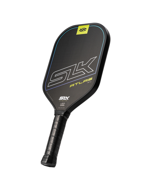 Black pickleball paddle with 'SLK' branding on a white background