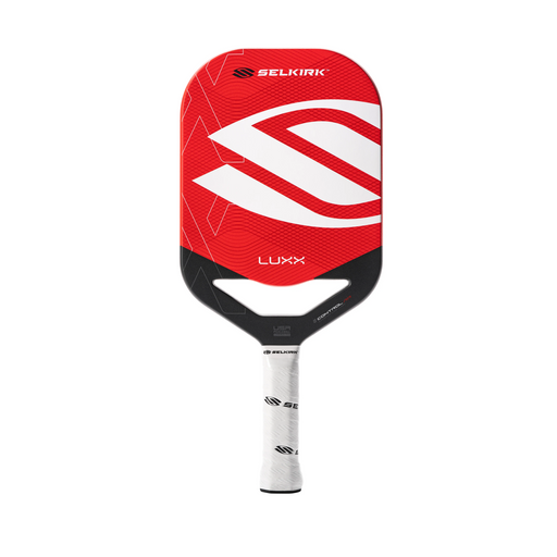 Red pickleball paddle with Selkirk branding on a white background