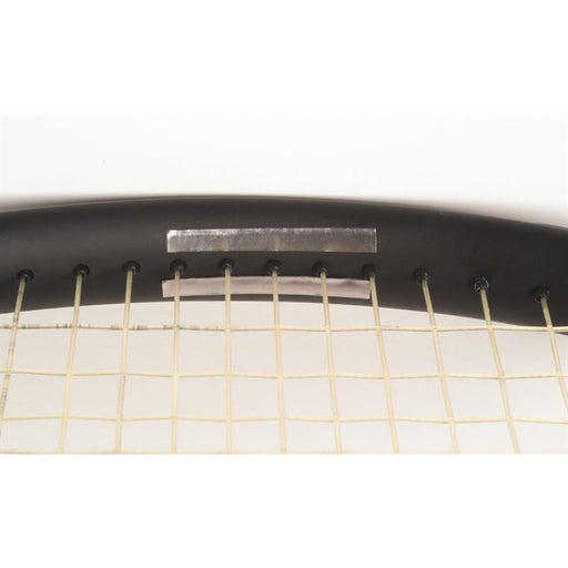 Close-up of a tennis racket with a white background