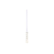 White candle with gold dots on a white background
