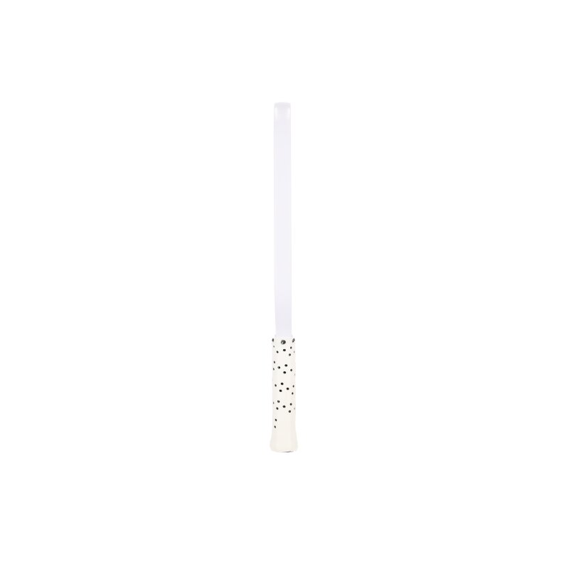White candle with gold dots on a white background