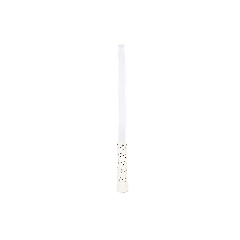 White toothbrush with black bristle pattern on a white background
