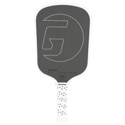 Gray pickleball paddle with a white handle on a white background