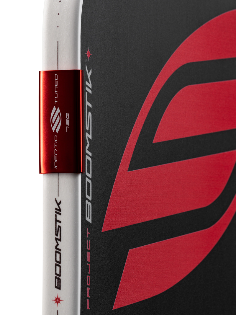 Pickleball Paddle with Boomstick branding on a black and red background