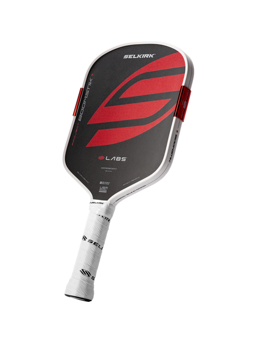 Selkirk paddle racket with red and black design on a white background