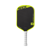Pickleball paddle with black and green design on a white background