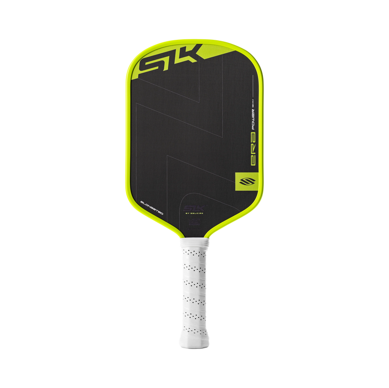 Pickleball paddle with black and green design on a white background