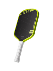 Pickleball paddle with black and green design on a white background