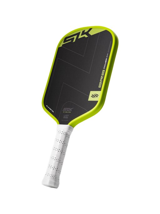 Pickleball paddle with black and green design on a white background