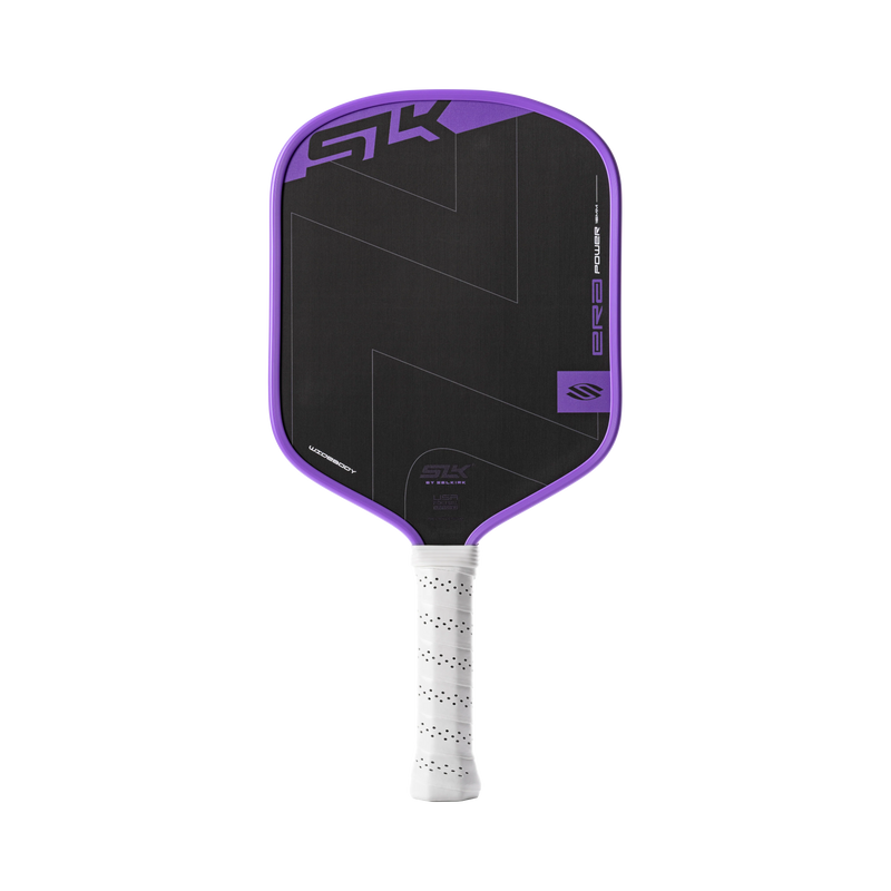 Purple and black pickleball paddle with white handle on a white background