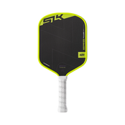 Pickleball paddle with black and green design on a white background