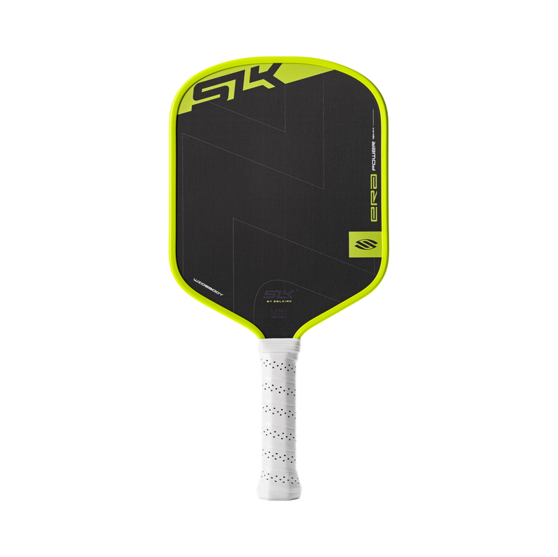 Pickleball paddle with black and green design on a white background