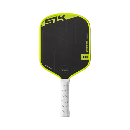 Pickleball paddle with black and green design on a white background