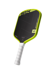Pickleball paddle with black and green design on a white background