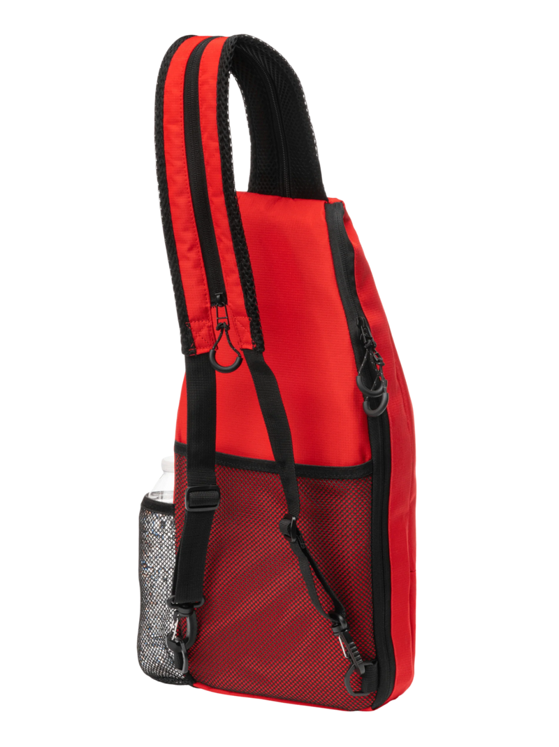 Red backpack with black straps on a white background