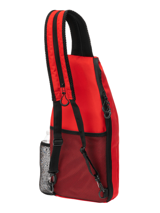 Red backpack with black straps on a white background