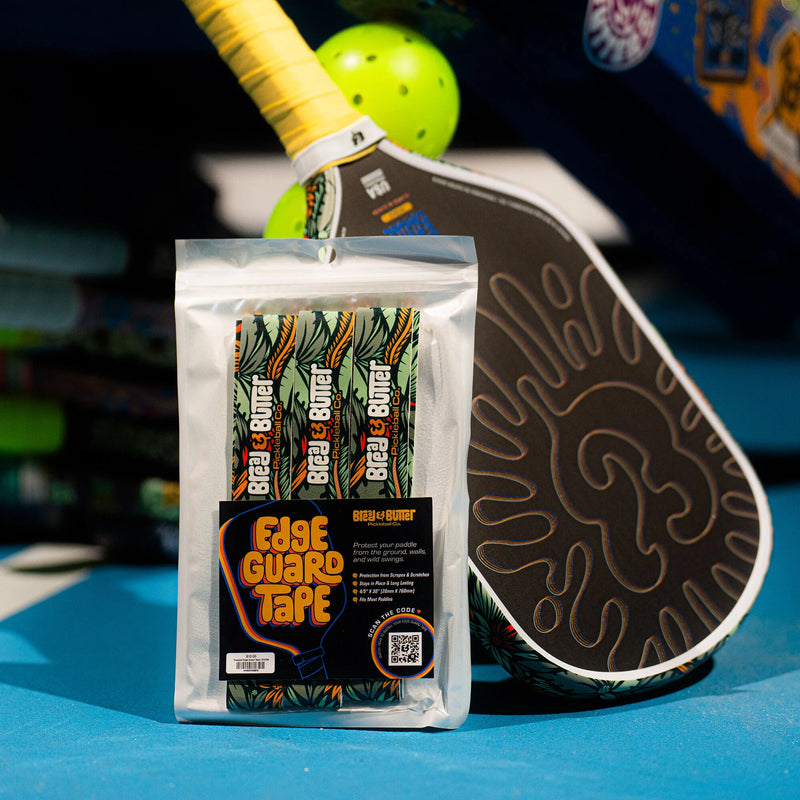 Packaged Edge Guard Tape with pickleball paddle in the background
