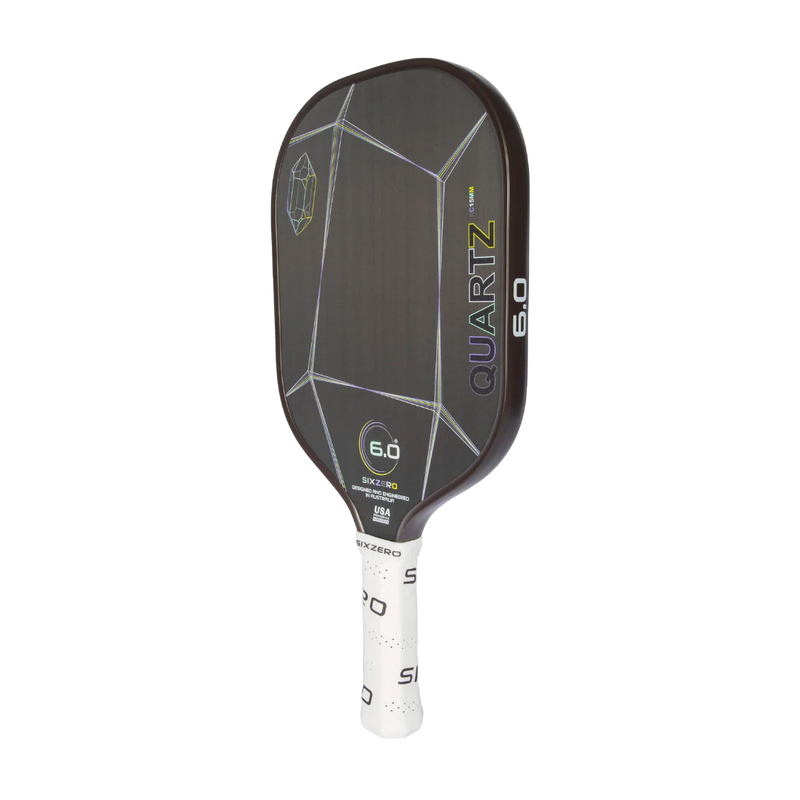 Pickleball paddle with 'Quartz' branding on a white background