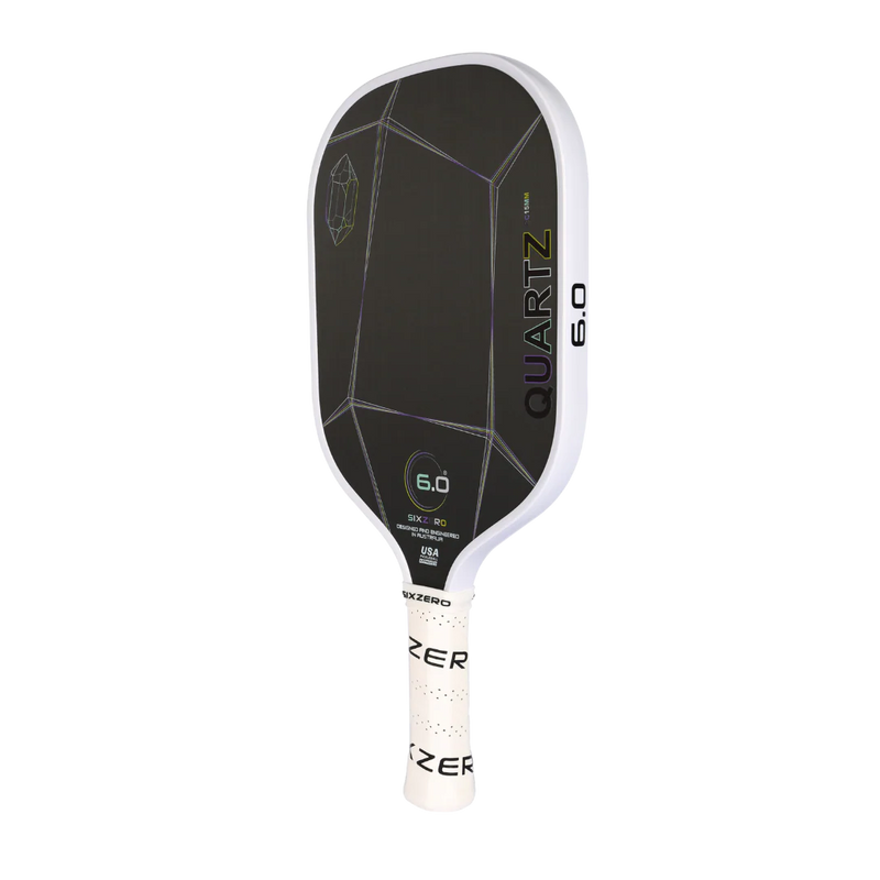 Pickleball paddle with 'Quartz' branding on a white background