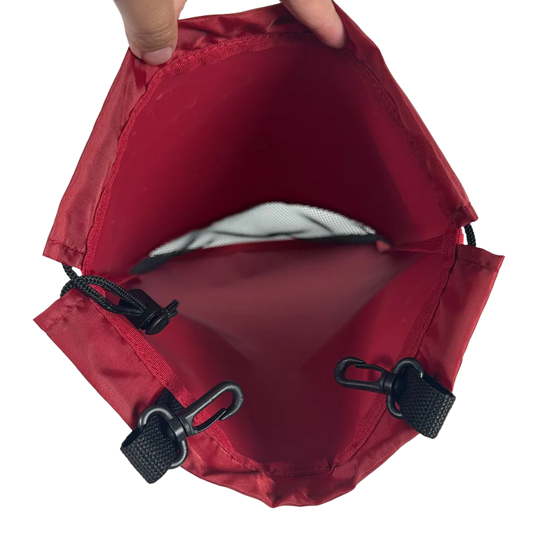 Red drawstring bag with black cord on a white background