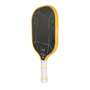Yellow and black pickleball paddle with 'Quartz' branding on a white background