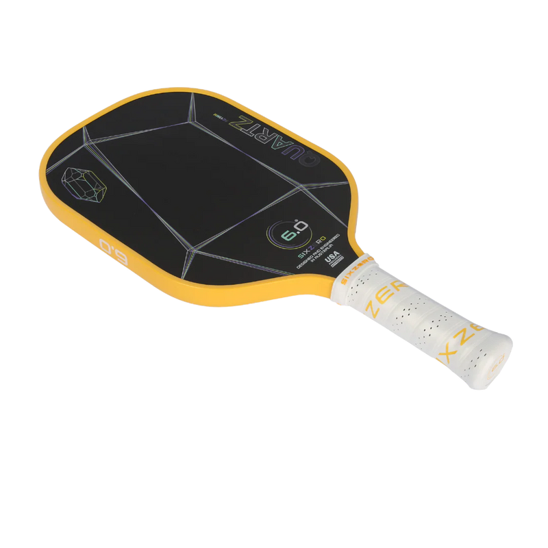 Yellow and black pickleball paddle with white handle on a white background