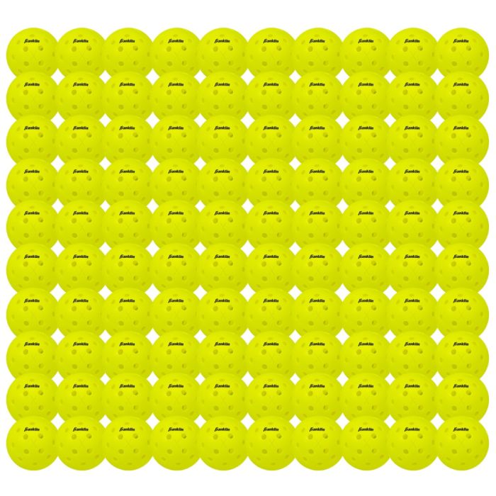 Multiple yellow balls with a brand logo on a white background
