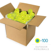 Box of pickleballs with a label indicating 100 outdoor pickleballs.