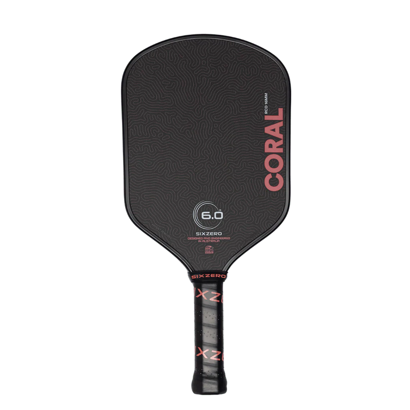 Black pickleball paddle with 'Coral' branding on a white background