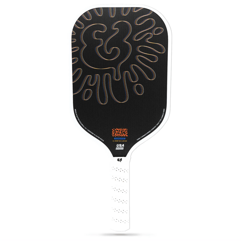 Black and white pickleball paddle with a unique design on a white background