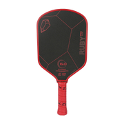 Red and black pickleball paddle with 'Ruby Pro' branding on a white background