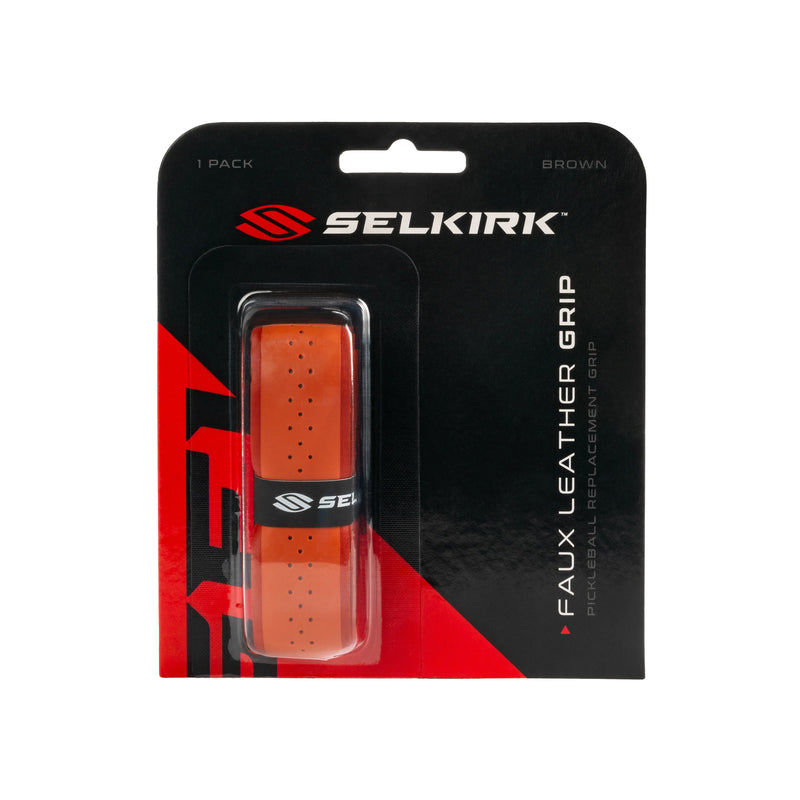 Selkirk faux leather grip packaging with orange grip inside on a white background