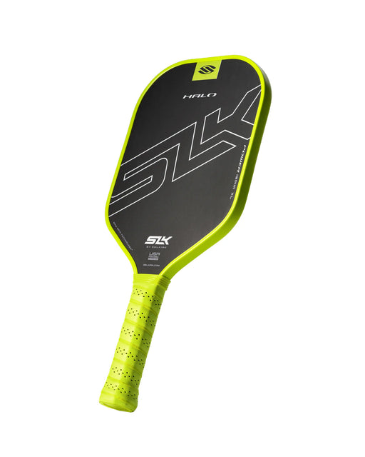 Pickleball paddle with black and yellow design on a white background