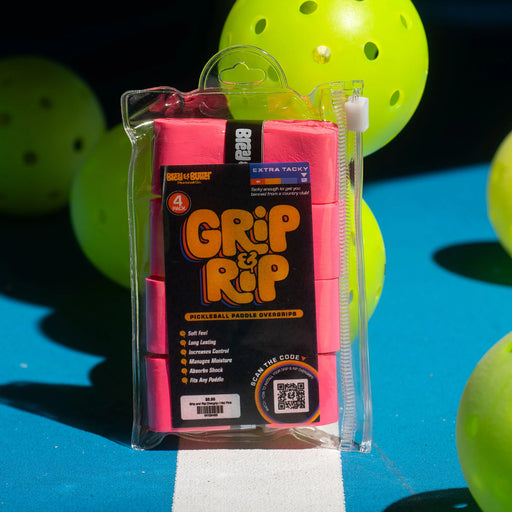 Packaged 'Grip It & Rip It' pickleball paddle overgrips with pickleballs in the background.
