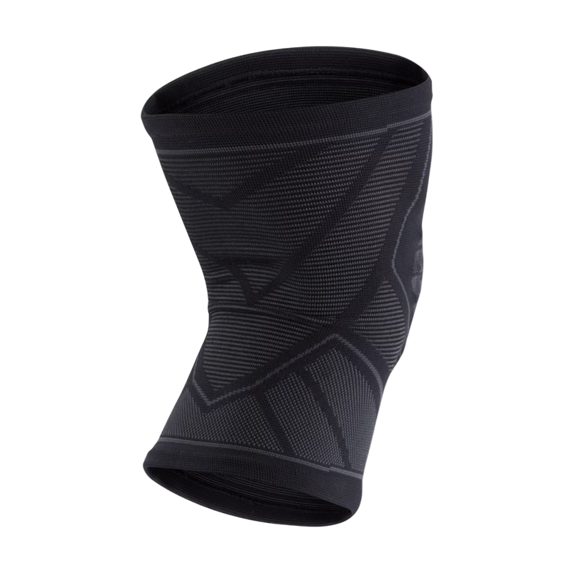 Black knee brace on a light gray background