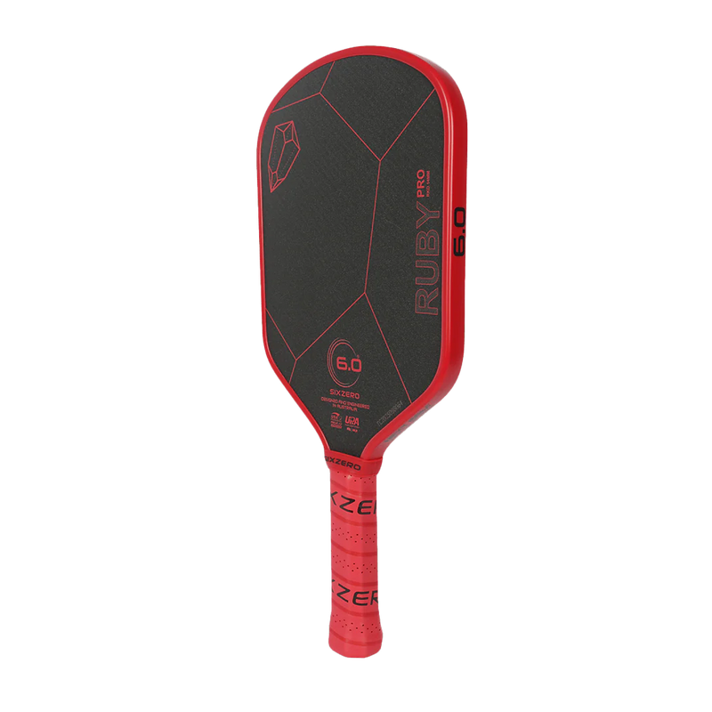 Red and black pickleball paddle with 'Ruby Pro' branding on a white background